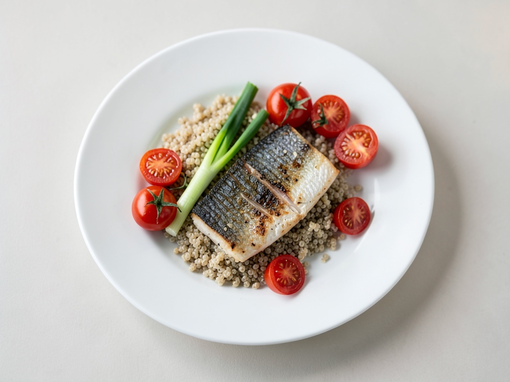 Insalata fresca di quinoa con pesce alla griglia